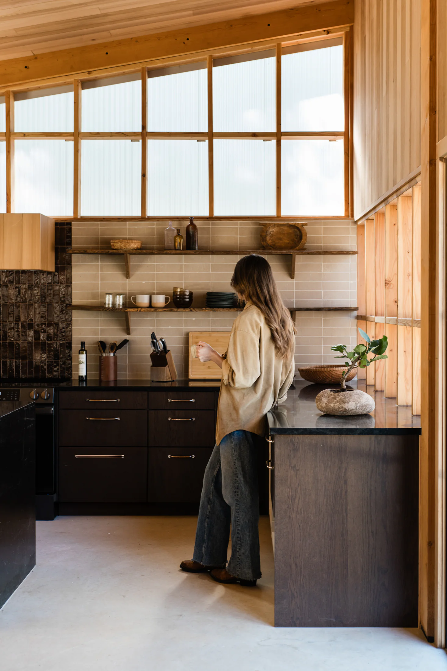 Serana lodge kitchen and shelves in warm light