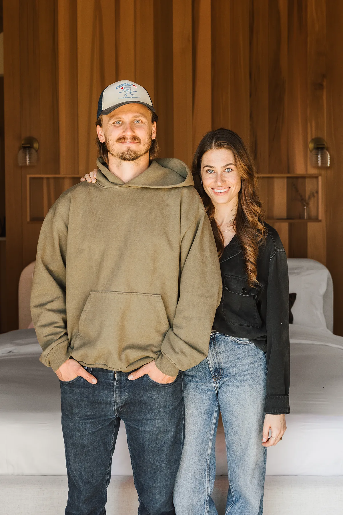 Serana founders Zach and Carlyle standing together inside a cabin